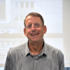 Headshot of Dr Shuster