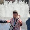 MSA student sits in front of fountain for picture