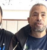 Derreck Johnson and David Clark smiling for the camera