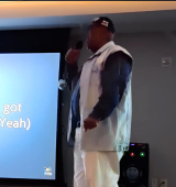 kenneth singing at the Y2K party