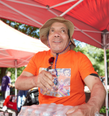 Howard Sturm helping at the refreshment booth at Central Park Challenge in 2024