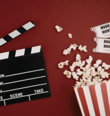 Representing movies we have a clapboard, popcorn and movie tickets