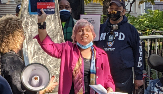 Elly Rufer speaking at an event