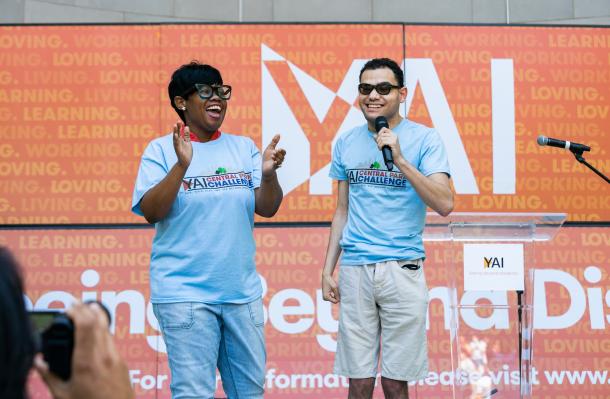 Two people up on stage during Central Park Challenge