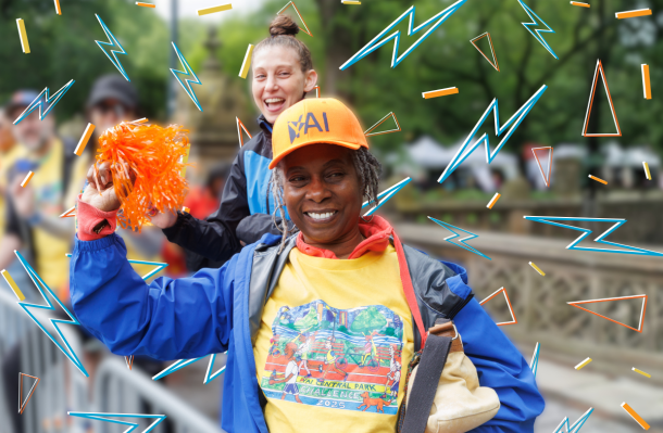 People standing in Central Park at the 2025 Central Park Challenge. They are wearing YAI gear and smiling