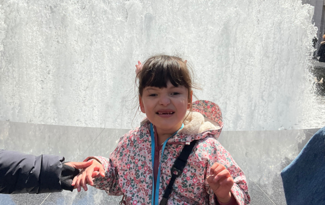 MSA student sits in front of fountain for picture