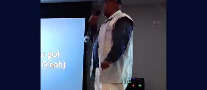kenneth singing at the Y2K party
