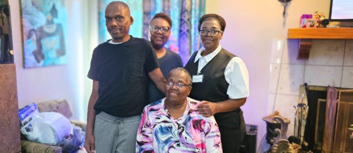 James Keys poses with his mother and sisters at his mother's home