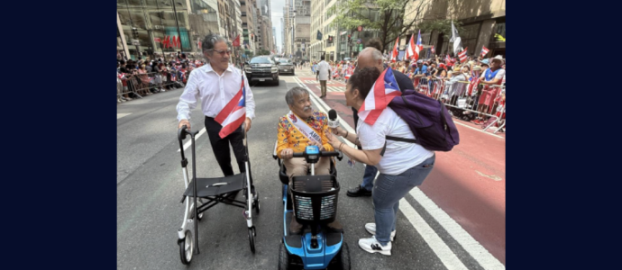 Geraldo and Bernard are interviewed at the Puerto Rican Day Parade