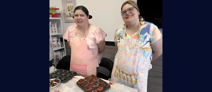 Ashley and her sister at a Baking Coach class for rainbow cookie cupcakes.