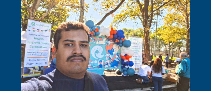 Orlando poses in Sunset Park at the Health Empowerment Fair