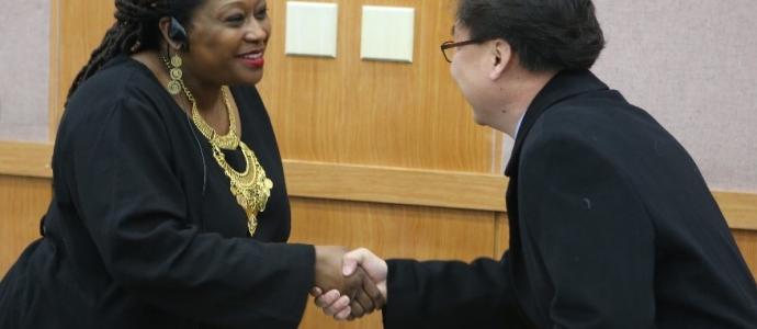 YAI’s Connie Senior meets with attendees during her training session in Seoul, South Korea.