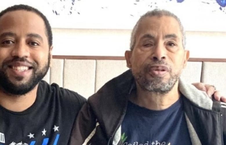 Derreck Johnson and David Clark smiling for the camera