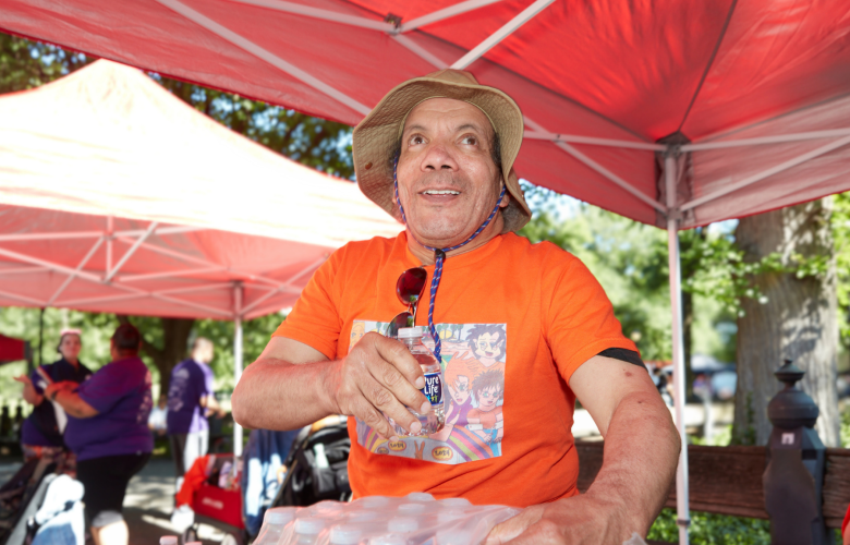 Howard Sturm helping at the refreshment booth at Central Park Challenge in 2024