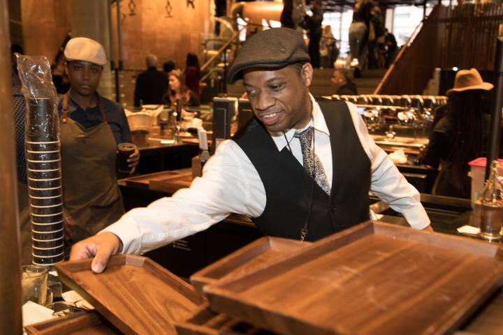 Andre Williams smiles and thrives in his role at Starbucks Roastery in September 2019.