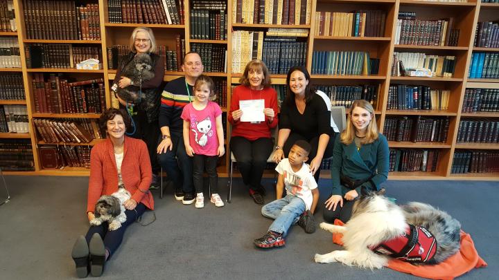 Photograph of MSA students with therapy dogs and their handlers from New York Therapy Animals