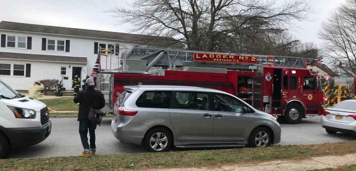 fire truck parked outside the sprucewood residence