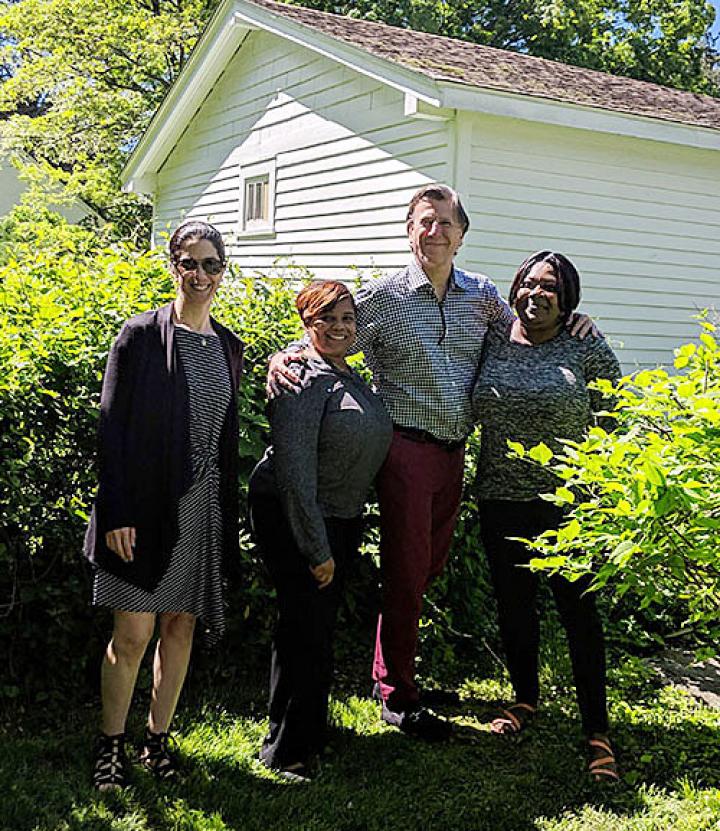 YAI’s CEO George Contos poses with staff during his visit to the Hudson Valley region.