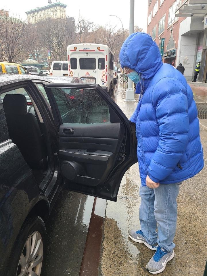 Javin Hunt about to get into a car (uber) about to visit family in NJ