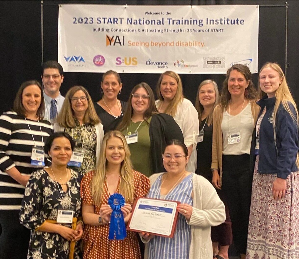 Group of START staff pose with awards