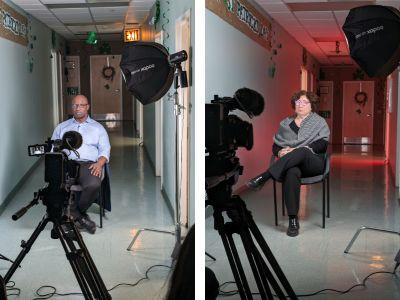 two pictures of people sitting in chairs in hallway in front of a video camera and lights.