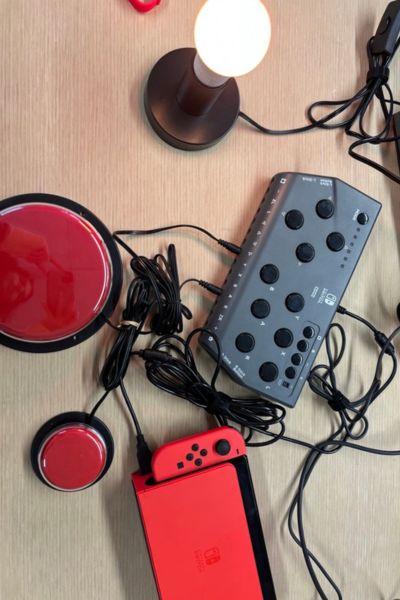a collection of AAC devices and regular electronic tools