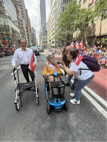 Geraldo and Bernard are interviewed at the Puerto Rican Day Parade