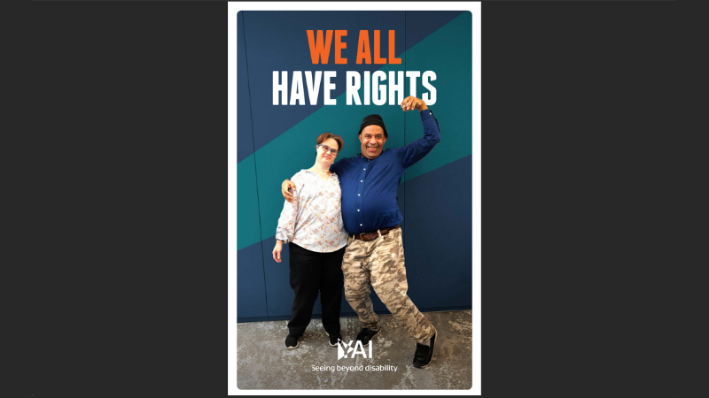 Cover of the "WE ALL HAVE RIGHTS" brochure, two people stand posing with the title above them and the YAI logo below