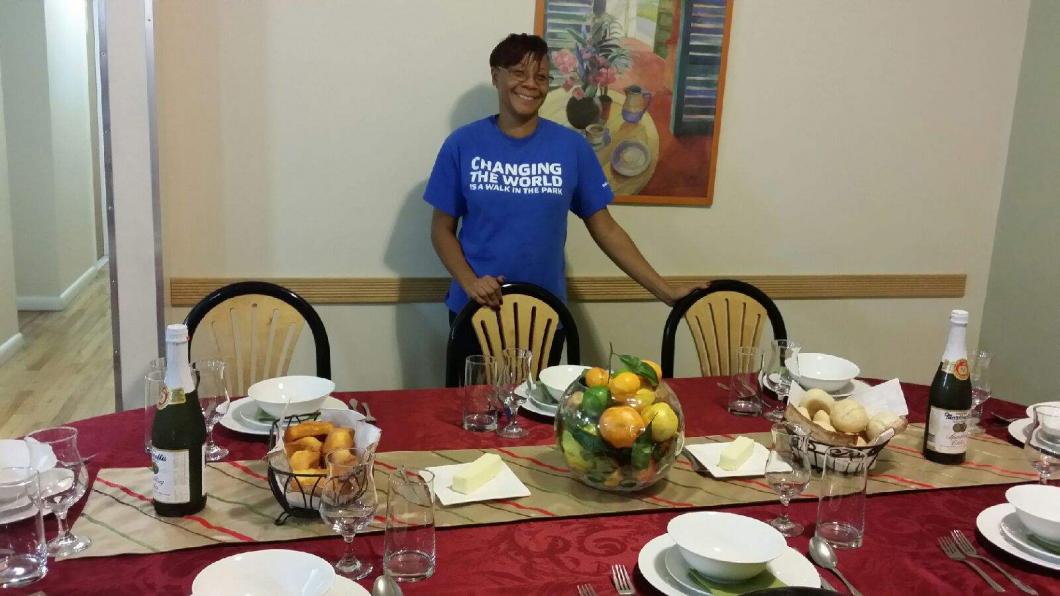 default title person stood at dinner table